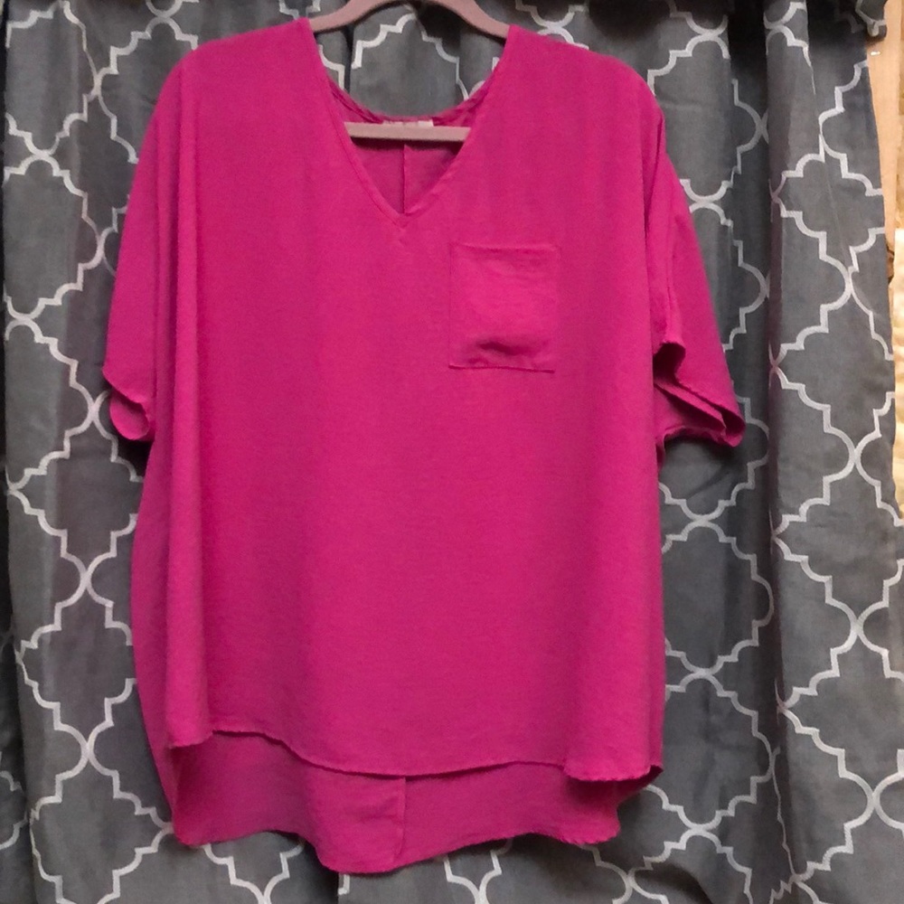 Women’s neon pink blouse